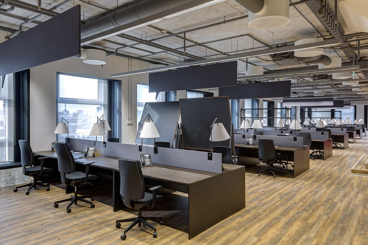 open plan office with bench desks and operator office chairs