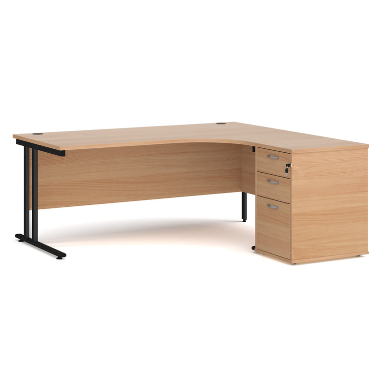 Beach panels and black legs curved office desk, bundled with a three drawer, desk high pedestal. Beech office furniture on white background.