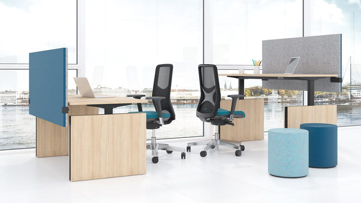 modern office furniture including operator chairs and height adjustable desks