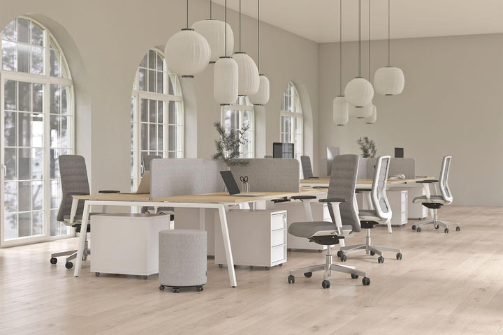 modern office space with mostly white office furniture