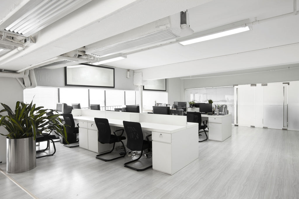 How is white office furniture a low-hanging fruit in office improvements?