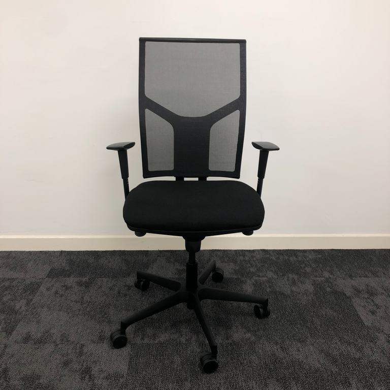 Front view of a black mesh office chair.