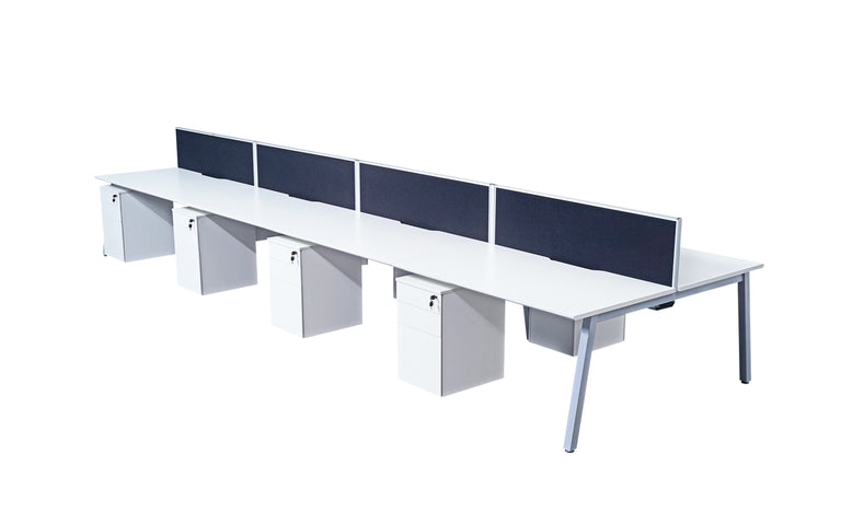 row of white bench desks with office underdesk pedestals and desktop divison panels