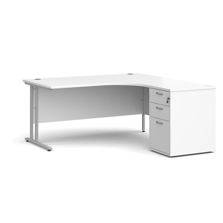White, curved left-hand office desk with a matching white pedestal with two keys and three drawers. White office furniture on white background.