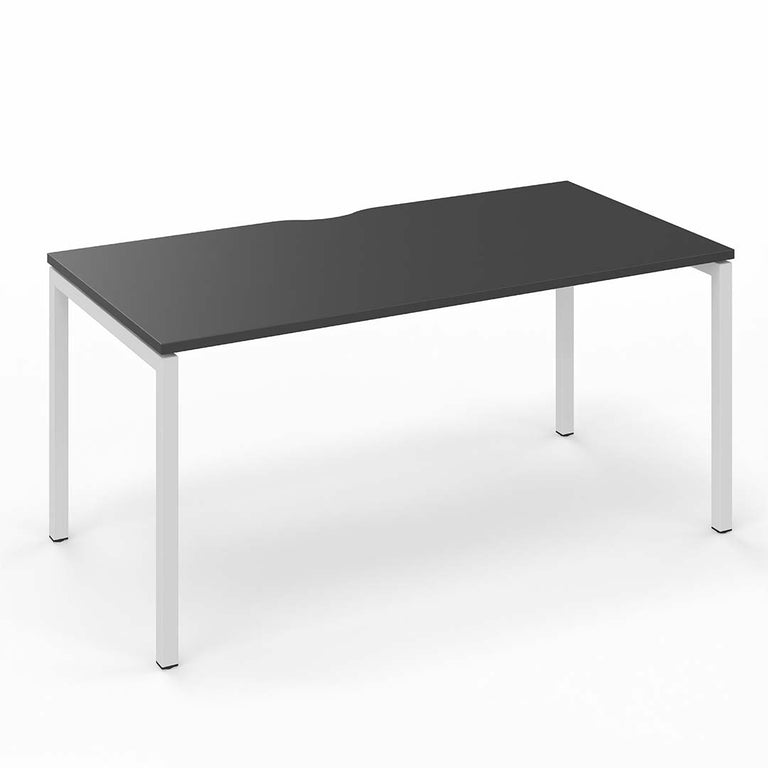 A single bench desks for a single person office workstation in open plan office. White straight legs and graphite desktop